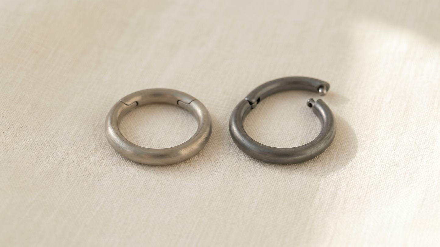 left a titanium hoop , right a niobium hoop