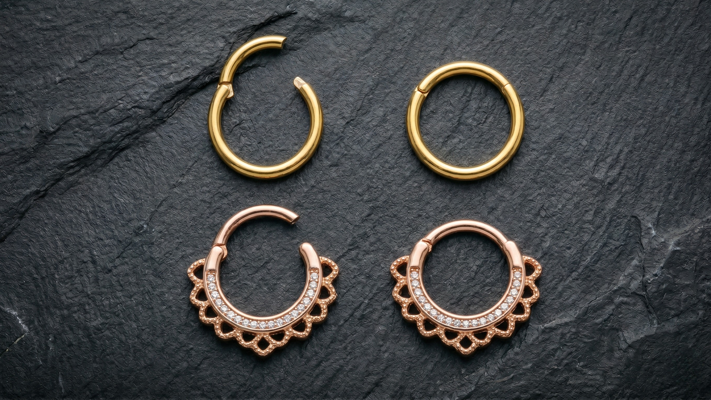 lay of four clicker rings on dark slate 