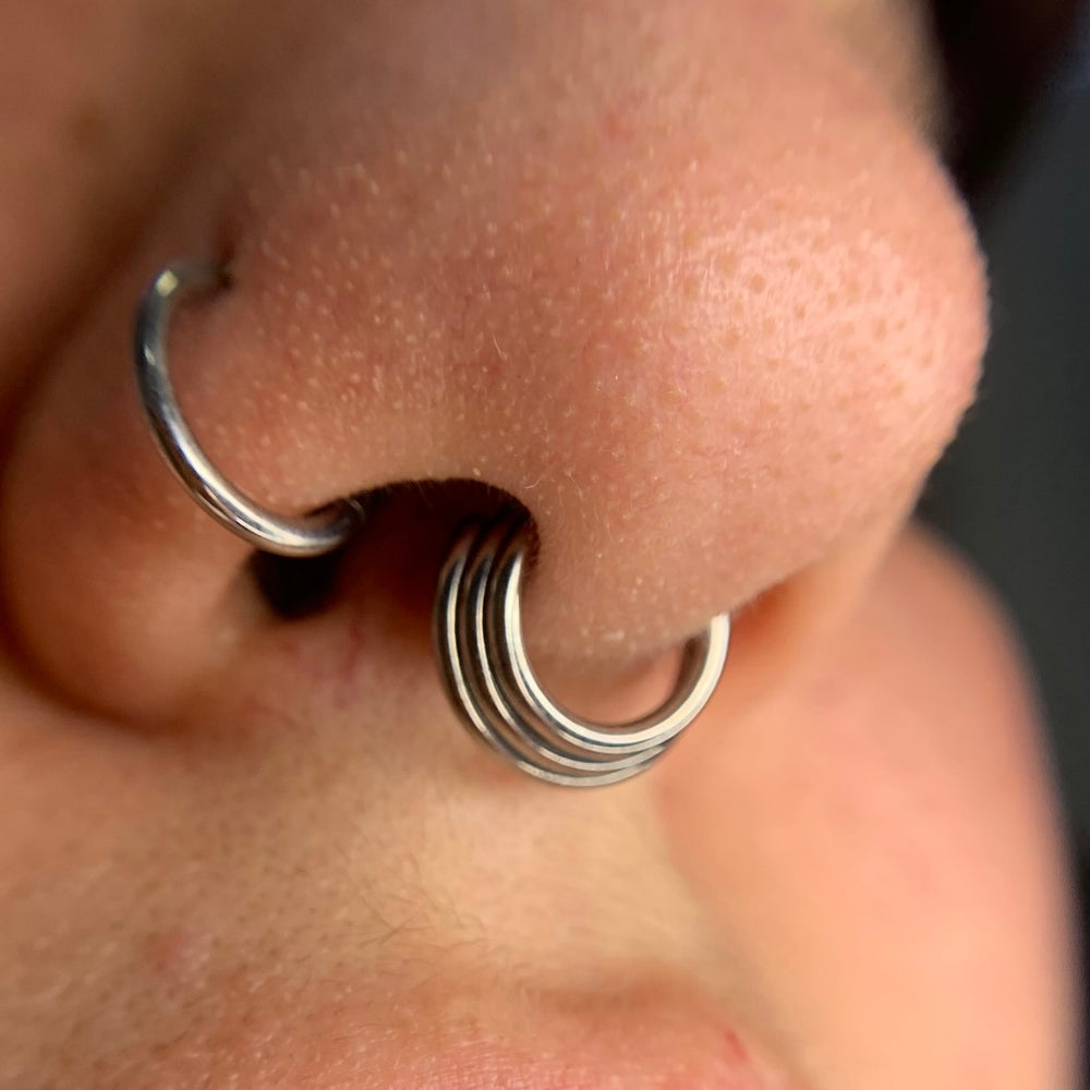 
                  
                    Argola de Três Camadas – Clicker em Titânio
                  
                