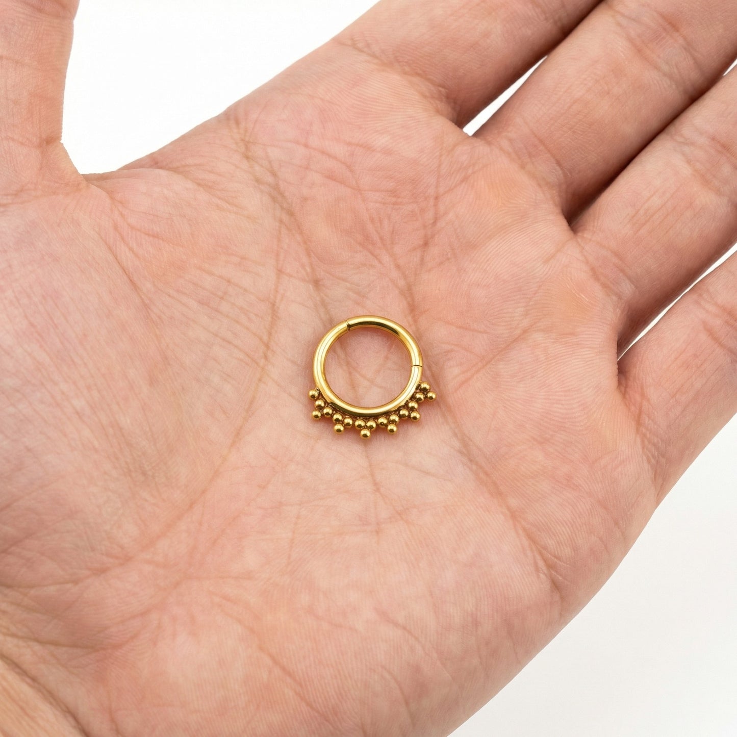 
                  
                    Ring met Trinitys Clicker Titanium ASTM Goud
                  
                