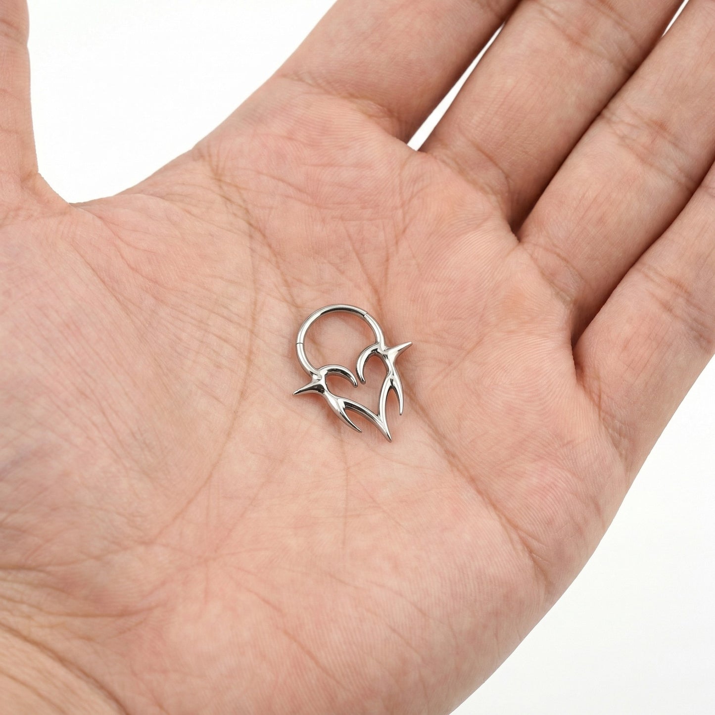 
                  
                    ARGOLA TRIBAL TITANIO
                  
                