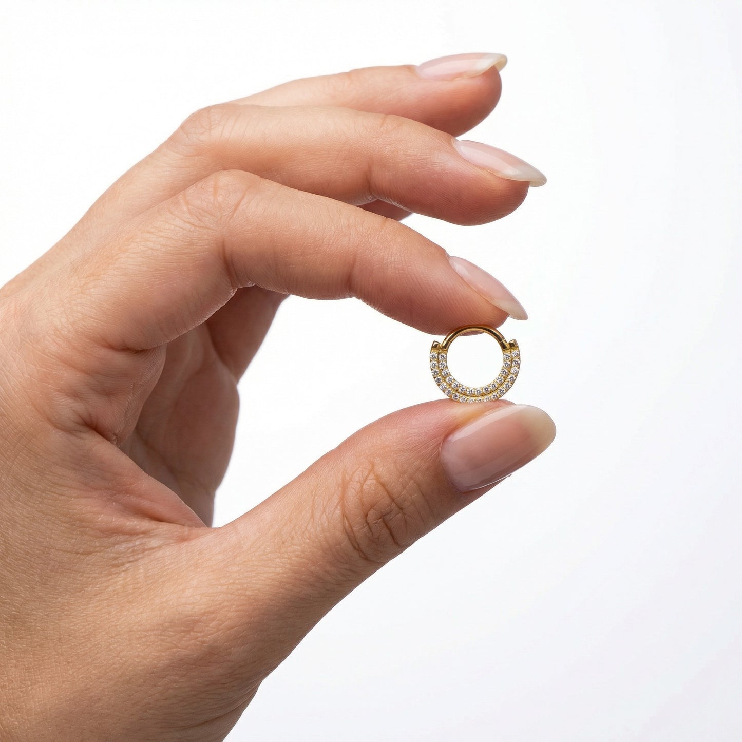 
                  
                    Anillo Doble Hilera Circonitas – Clicker Titanio PVD Oro
                  
                