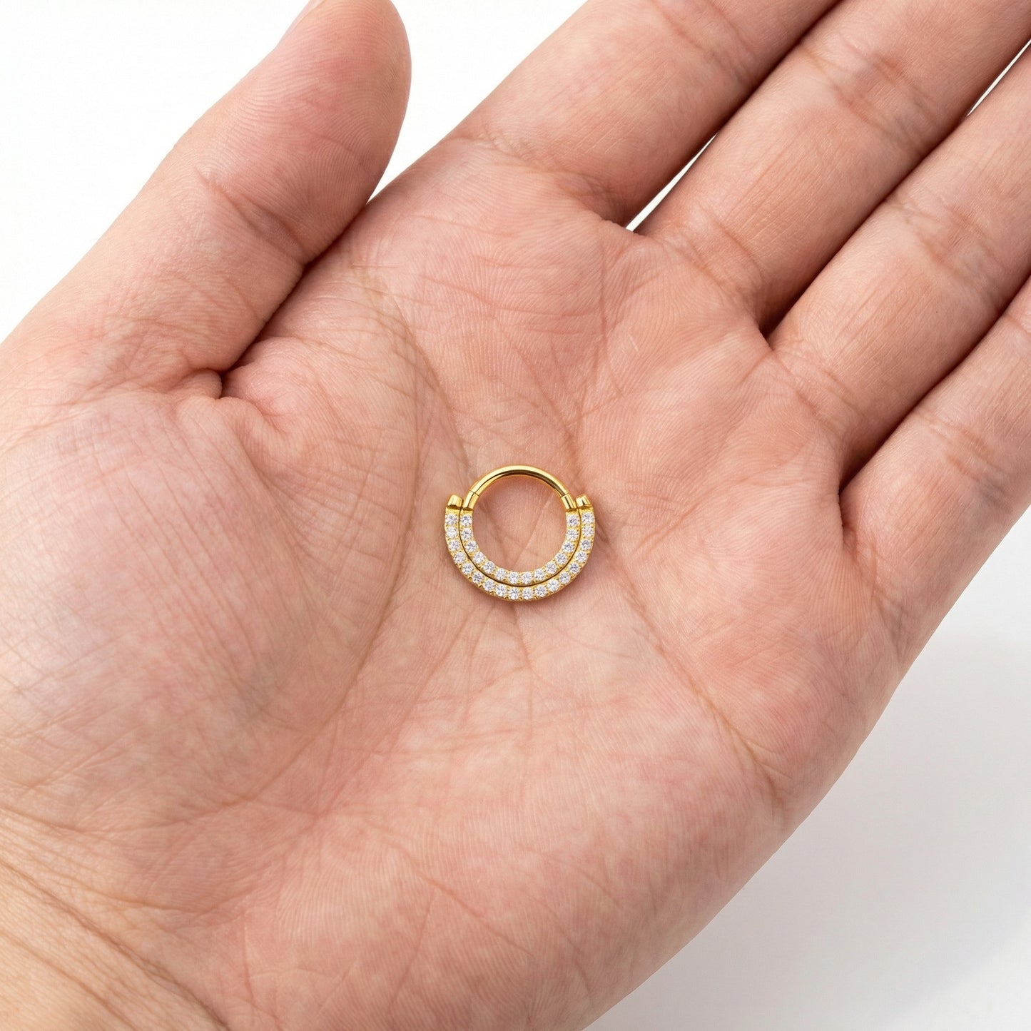 
                  
                    Anillo Doble Hilera Circonitas – Clicker Titanio PVD Oro
                  
                