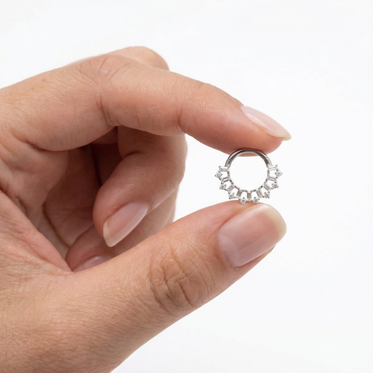 
                  
                    Argola com Zircónias Baguete em titanio
                  
                