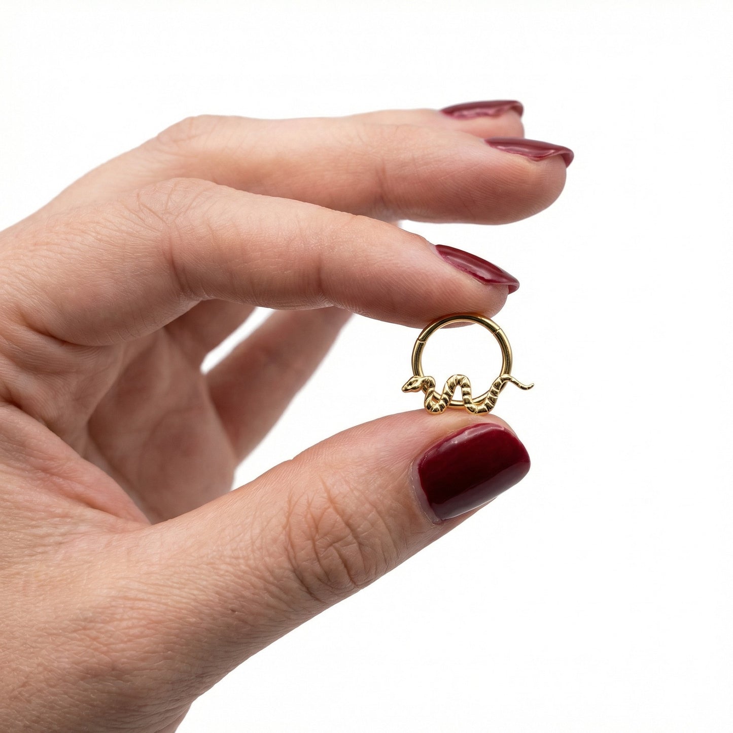 
                  
                    argola cobra titanio gold
                  
                