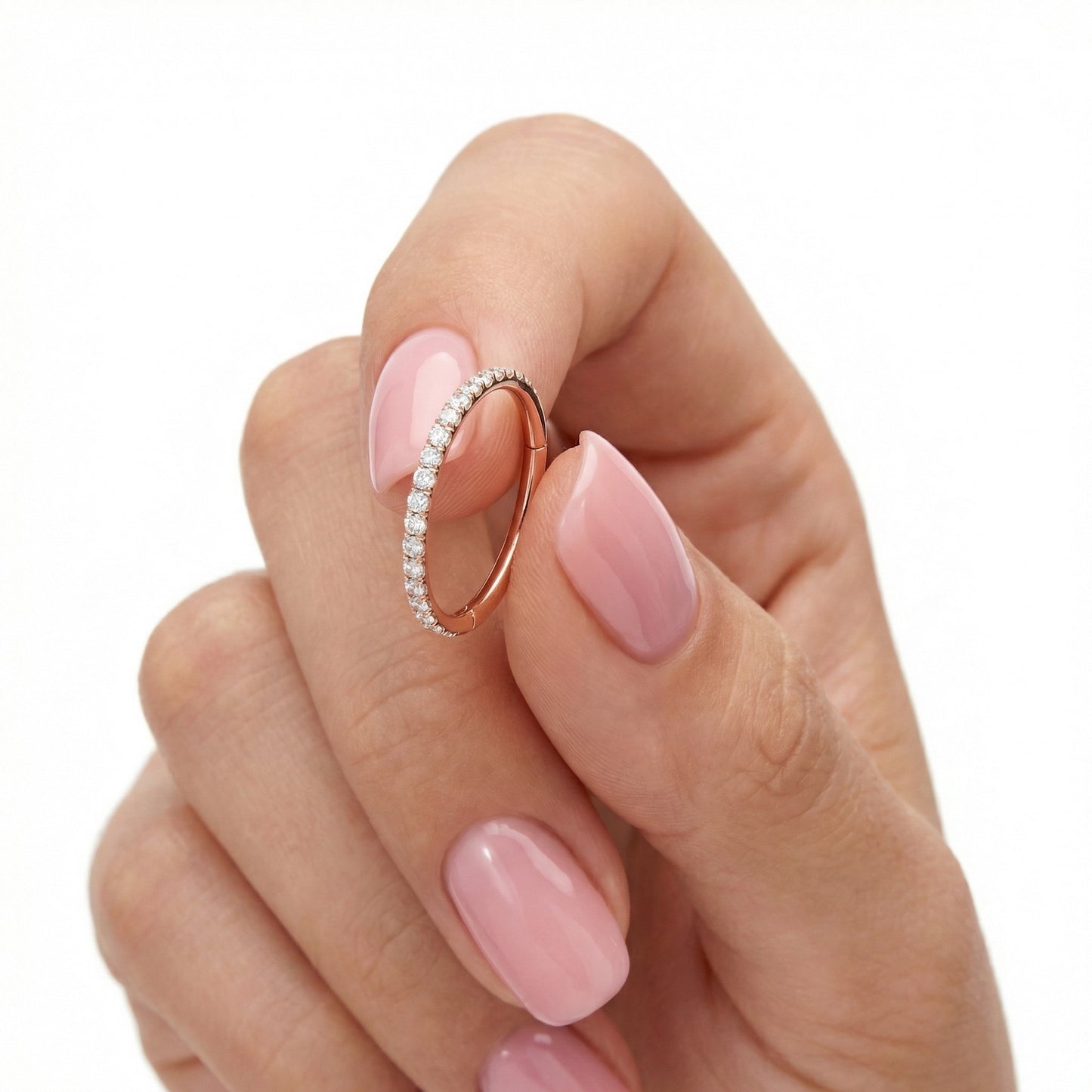 
                  
                    argola com zircónias frontais rose gold, piercing nariz e orelha
                  
                