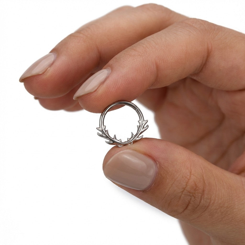 
                  
                    argola espinhos titanio
                  
                