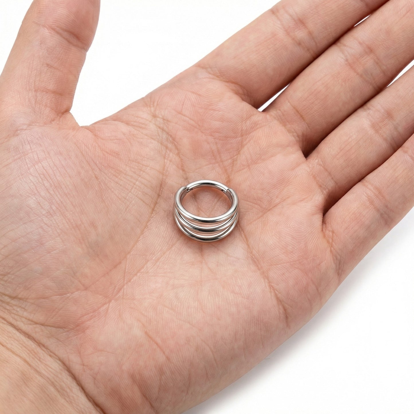 
                  
                    argola tripla titanio
                  
                