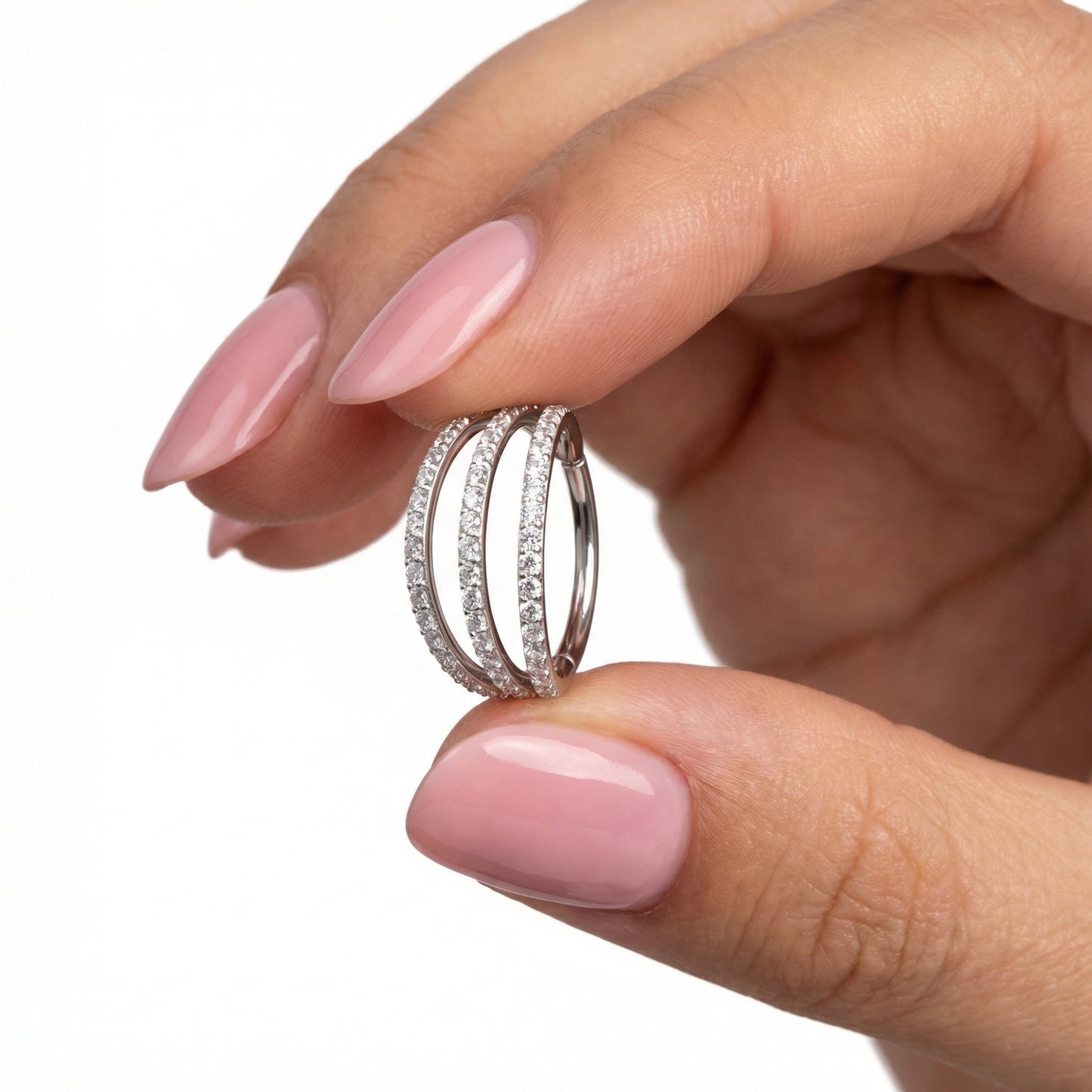 
                  
                    argola tripla com zircónias em titanio
                  
                