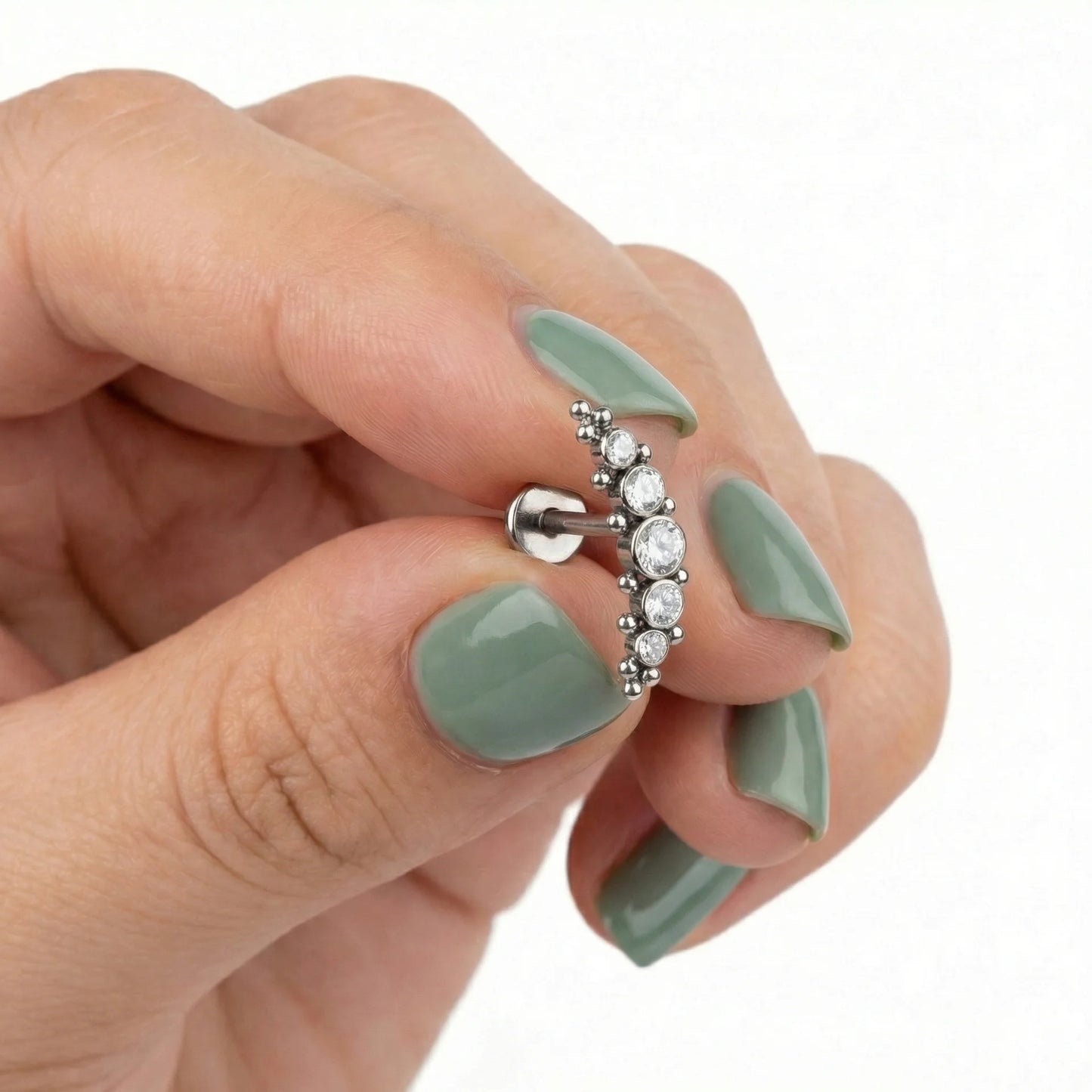 
                  
                    Labret com 5 zircónias e missangas, em Titânio 
                  
                