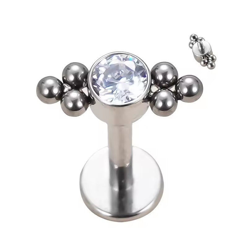 Labret avec zircone centrale et deux perles trinitaires, en titane ASTM, filetage interne