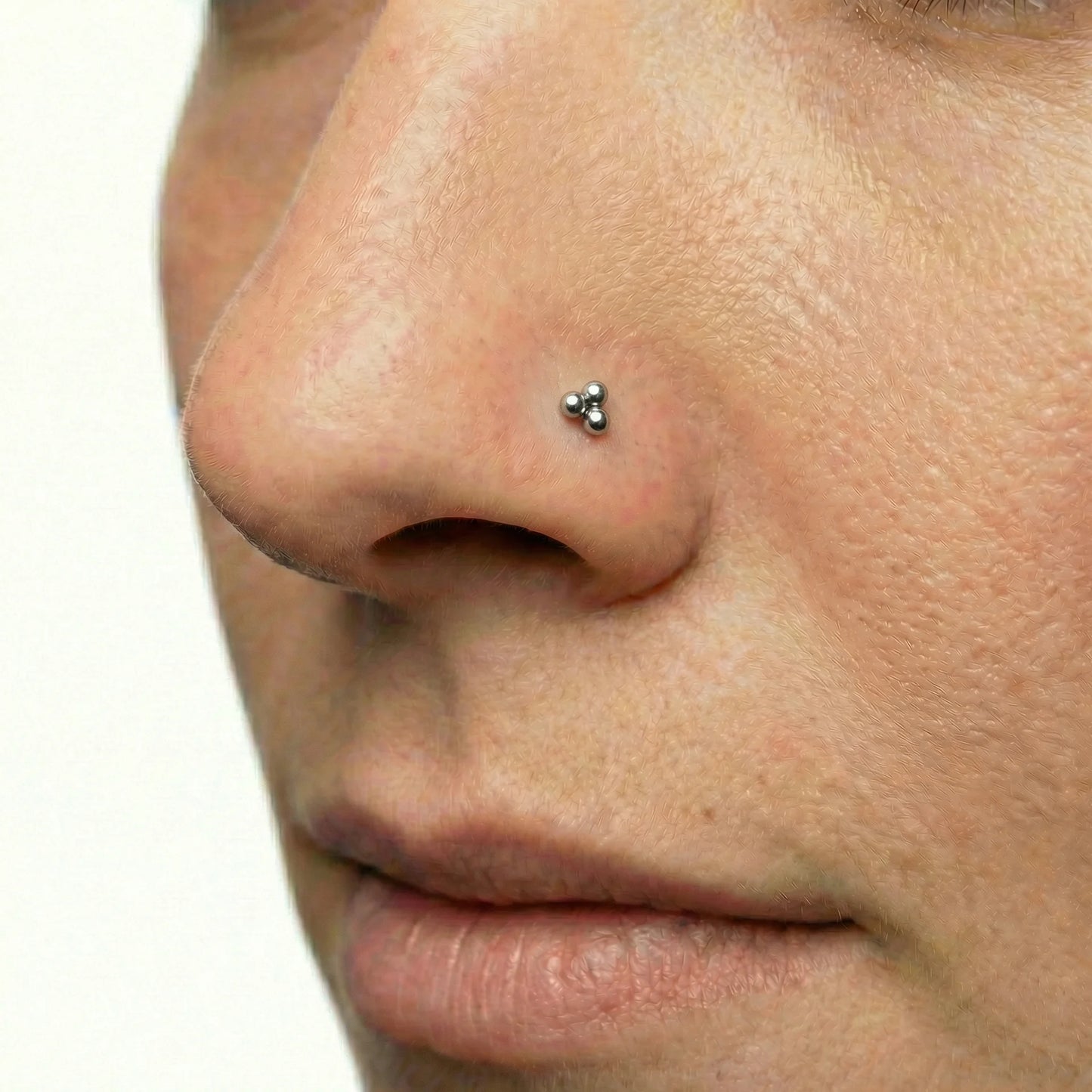 labret trinity, piercing nariz.