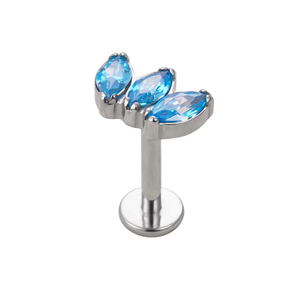 
                  
                    Labret en titane avec 3 zirconias marquées incurvées - filetage interne, hypoallergénique
                  
                