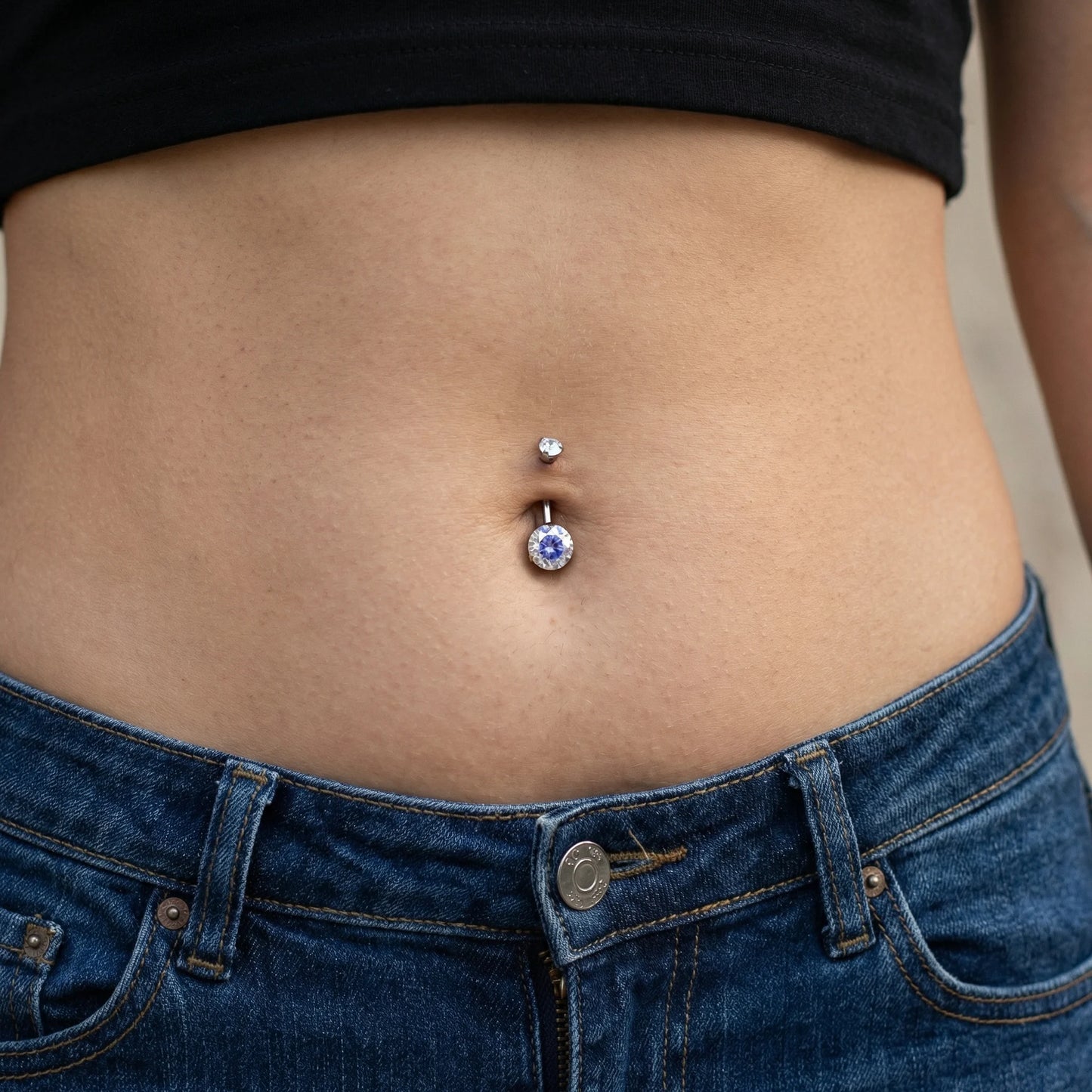 
                  
                    Piercing de Umbigo c/ Zircónias Cravejadas
                  
                