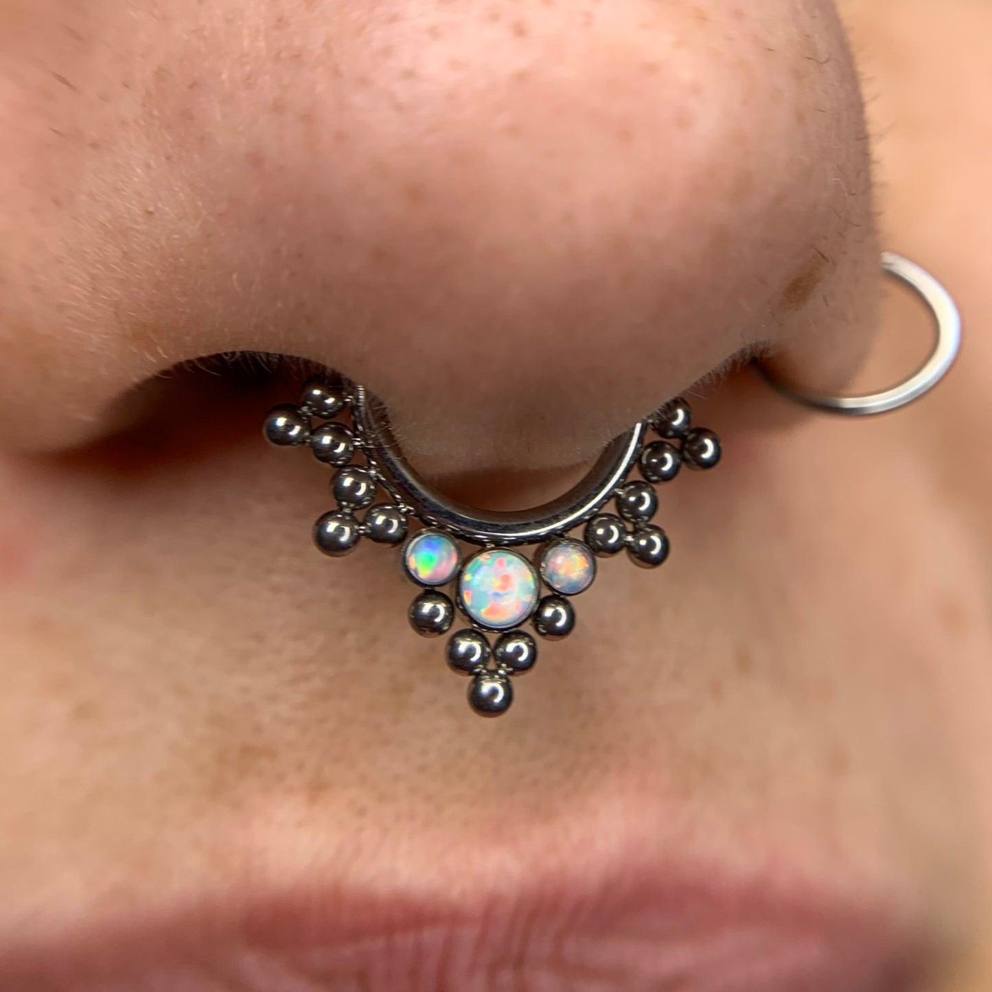 
                  
                    Ring with Opals and Spheres - ASTM Titanium Clicker
                  
                
